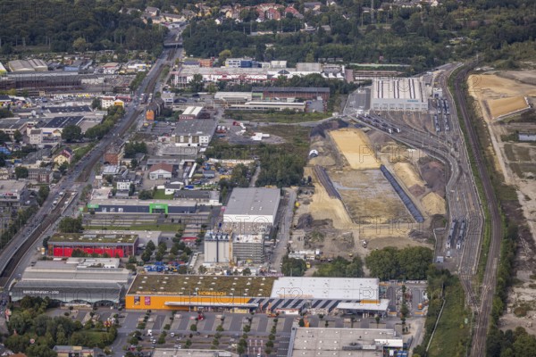 Aerial view, construction site at the old Westfalenhütte with Siemens Rail Service Centre in the City district of Dortmund, Ruhr area, North Rhine-Westphalia, Germany, construction area, construction site, building plots, construction project, construction site, brownfield site, DE, Dortmund, Europe, commercial enterprises, commercial area, commercial site, commercial use, industrial area, industrial site, aerial view, aerial photography, aerial photography, overview, bird's-eye view, bird's-eye view, overview
