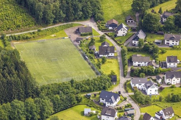 Aerial view, sports field in Schreibershof, Drolshagen, Sauerland, North Rhine-Westphalia, Germany, DE, Europe, football field, property tax, hilly landscape, real estate, aerial photography, aerial photography, aerial photography, sports, sports facilities, sports field, sports facility, overview, bird's-eye view, residential complex, living and living, residential area, residential buildings, quality of life, birds-eyes view, overview