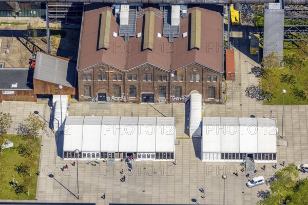 Aerial view, Phoenix-West industrial estate and local recreation area, Corona rapid test centre in the Warsteiner Music Hall, Hörde, Dortmund, Ruhr area, North Rhine-Westphalia, Germany, distance rule, Corona measures, Corona virus, Corona test centre, Covid-19, DE, Europe, hygiene measures, aerial view, aerial photography, aerial photography, overview, virus, bird's-eye view, tent, birds-eyes view, former Phoenix Hall, former blast furnace plant, overview