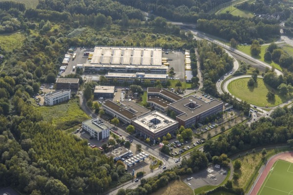 Aerial view, commercial area Revierstraße with Deutsche Post letter centre in the district Kirchlinde in Dortmund, Ruhr area, North Rhine-Westphalia, Germany, DE, Dortmund, Europe, commercial enterprises, commercial area, commercial park, commercial location, commercial use, industrial area, industrial location, aerial photograph, aerial photography, aerial photography, overview, bird's-eye view, overview