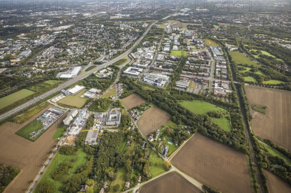 Technical University Dortmund Campus North and construction sites Im Weißen Feld at Brennaborstraße and Sebrathweg in the district Oespel in Dortmund, Ruhr area, North Rhine-Westphalia, Germany, motorway A40, construction work, construction area, construction site, building plots, construction project, Campus North, DE, Dortmund, Europe, distant view, green area technology park, aerial view, aerial photograph, aerial photography, aerial photography, new building, Sebrathweg, TU Dortmund, Dortmund University of Technology, overview, University of Dortmund, Verizon Germany, bird's-eye view, Weißes Feld, birds-eyes view, overview