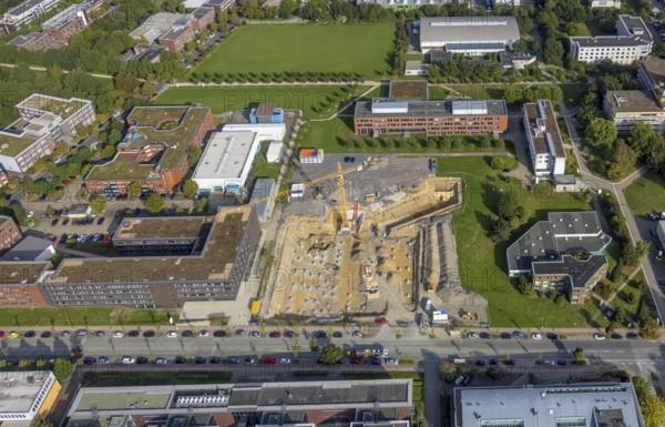 Aerial view, construction site for new refrigeration plant in Dortmund Technology Park on Otto-cock-Straße in the Eichlinghofen district of Dortmund, Ruhr area, North Rhine-Westphalia, Germany, construction work, construction area, building site, building plots, construction project, construction site, DE, Dortmund, Europe, aerial view, aerial photography, aerial photography, new building, TU Dortmund, Dortmund University of Technology, overview, bird's-eye view, overview, Dortmund Technology Park