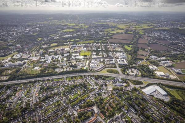 Aerial view of the TZDO - TechnologieZentrumDortmund GmbH, Technical University Dortmund Campus North with the Technology Centre and EMC Test North Rhine-Westphalia GmbH EMC Competence Centre as well as construction site for the CALEDO research centre next to the Faculty of Computer Science in the Oespel district of Dortmund, Ruhr area, North Rhine-Westphalia, Germany, A40 motorway, construction work, construction site, building plots, construction avenue, construction measure, construction project, construction site, education, educational institution, north campus, south campus, DE, Dortmund, Elmos Semiconductor SE, Emil-Figge-Straße, Europe, distant view, green area technology park, aerial view, aerial photograph, aerial photography, aerial photography, new building, TU Dortmund, Dortmund University of Technology, overview, University of Dortmund, bird's-eye view, overview