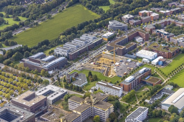 Aerial view of the TZDO - TechnologieZentrumDortmund GmbH, Technical University of Dortmund with the BioMedicine Centre BMZ and Max Planck Institute of Molecular Physiology as well as the construction site for the CALEDO research centre next to the Faculty of Computer Science on Otto-cock-Straße in the Eichlinghofen district of Dortmund, Ruhr area, North Rhine-Westphalia, Germany, construction work, construction area, building site, building plots, construction project, building site, Campus North, Center for Advanced Liquid-Phase Engineering Dortmund (CALEDO), DE, Dortmund, Europe, aerial view, aerial photography, aerial photography, new building, TU Dortmund, Technical University Dortmund, overview, bird's-eye view, overview