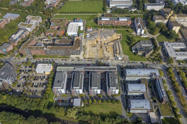 Aerial view, construction site for new refrigeration plant in Dortmund Technology Park on Otto-cock-Straße in the Eichlinghofen district of Dortmund, Ruhr area, North Rhine-Westphalia, Germany, construction work, construction area, building site, building plots, construction project, construction site, DE, Dortmund, Europe, aerial view, aerial photography, aerial photography, new building, TU Dortmund, Dortmund University of Technology, overview, bird's-eye view, overview, Dortmund Technology Park
