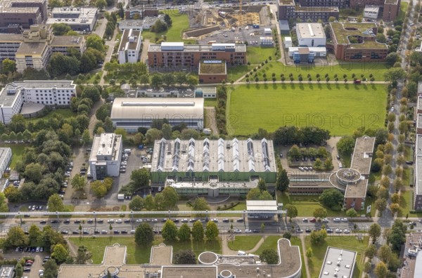 Aerial view of TZDO - TechnologieZentrumDortmund GmbH, Technische Universität Dortmund Campus Nord with the Technology Centre and EMC Test North Rhine-Westphalia GmbH EMC Competence Centre in the Oespel district in Dortmund, Ruhr area, North Rhine-Westphalia, Germany, motorway A40, Baumallee, education, educational institution, Campus Nord, DE, Dortmund, Emil-Figge-Straße, Europe, distant view, green area technology park, aerial view, aerial photograph, aerial photography, aerial photography, TU Dortmund, Technische Universität Dortmund, overview, University of Dortmund, bird's eye view, birds-eyes view, overview