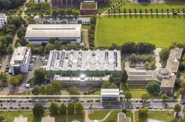 Aerial view of TZDO - TechnologieZentrumDortmund GmbH, Technische Universität Dortmund Campus Nord with the Technology Centre and EMC Test North Rhine-Westphalia GmbH EMC Competence Centre in the Oespel district in Dortmund, Ruhr area, North Rhine-Westphalia, Germany, motorway A40, Baumallee, education, educational institution, Campus Nord, DE, Dortmund, Emil-Figge-Straße, Europe, distant view, green area technology park, aerial view, aerial photograph, aerial photography, aerial photography, TU Dortmund, Technische Universität Dortmund, overview, University of Dortmund, bird's eye view, birds-eyes view, overview