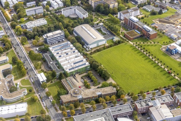 Aerial view of TZDO - TechnologieZentrumDortmund GmbH, Technische Universität Dortmund Campus Nord with the Technology Centre and EMC Test North Rhine-Westphalia GmbH EMC Competence Centre in the Oespel district in Dortmund, Ruhr area, North Rhine-Westphalia, Germany, motorway A40, Baumallee, education, educational institution, Campus Nord, DE, Dortmund, Emil-Figge-Straße, Europe, distant view, green area technology park, aerial view, aerial photograph, aerial photography, aerial photography, TU Dortmund, Technische Universität Dortmund, overview, University of Dortmund, bird's eye view, birds-eyes view, overview