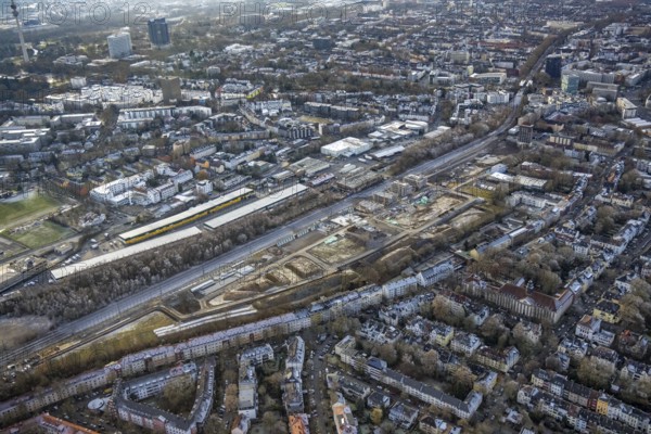 Aerial view, construction site Kronprinzenviertel for new construction of residential units Am Wasserturm Südbahnhof in the district Westfalendamm in Dortmund, Ruhr area, North Rhine-Westphalia, Germany, construction work, building monument, construction, construction area, building site, building plots, construction measure, construction project, construction site, DE, monument, Dortmund, Europe, aerial view, aerial photography, aerial photography, tower, overview, bird's-eye view, water tower Dortmunder Südbahnhof, housing estate, housing and living, residential area, residential quality, residential neighbourhood, housing estate, birds-eyes view, overview