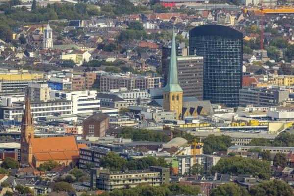 View of the city centre with the Church of Our Lady of the Holy Sepulchre, the Protestant Church of St. Peter, the Sparkasse Tower and the RWE Tower. Petri, Sparkassenhochhaus and RWE Tower in the City district of Dortmund, Ruhr area, North Rhine-Westphalia, Germany, place of worship, office tower, City, DE, Dortmund, Europe, religious community, place of worship, holy place, high-rise building, city centre, church, parish, denomination, RWE Vertrieb AG headquarters, aerial view, aerial photograph, aerial photography, aerial photography, local view, Petrikirche, RWE Tower, religion, religious site, skyline, townscape, city centre, overview, bird's-eye view, overview