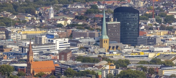 View of the city centre with the Church of Our Lady of the Holy Sepulchre, the Protestant Church of St. Peter, the Sparkasse Tower and the RWE Tower. Petri, Sparkassenhochhaus and RWE Tower in the City district of Dortmund, Ruhr area, North Rhine-Westphalia, Germany, place of worship, office tower, City, DE, Dortmund, Europe, religious community, place of worship, holy place, high-rise building, city centre, church, parish, denomination, RWE Vertrieb AG headquarters, aerial view, aerial photograph, aerial photography, aerial photography, local view, Petrikirche, RWE Tower, religion, religious site, skyline, townscape, city centre, overview, bird's-eye view, overview