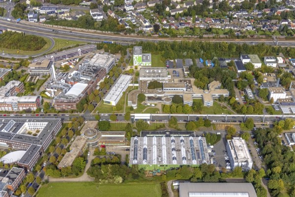 Aerial view of the TZDO - TechnologieZentrumDortmund GmbH, Technical University Dortmund Campus North with the Technology Centre and EMC Test North Rhine-Westphalia GmbH EMC Competence Centre as well as the Fraunhofer Institute for Material Flow and Logistics in the Oespel district of Dortmund, Ruhr area, North Rhine-Westphalia, Germany, motorway A40, tree avenue, education, educational institution, Campus North, DE, Dortmund, Emil-Figge-Straße, Europe, distant view, green area technology park, aerial view, aerial photograph, aerial photography, aerial photography, TU Dortmund, Dortmund University of Technology, overview, University of Dortmund, bird's-eye view, birds-eyes view, overview