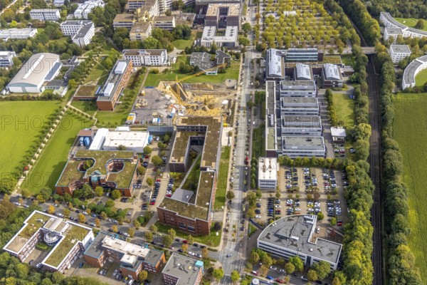 Aerial view of the TZDO - TechnologieZentrumDortmund GmbH, Technische Universität Dortmund with the BioMedizinZentrum BMZ and Max-Planck-Institut für molekulare Physiologie as well as construction site for the research centre CALEDO at Otto-cock-Straße in the district Eichlinghofen in Dortmund, Ruhr area, North Rhine-Westphalia, Germany, construction work, construction area, building site, building plots, construction project, building site, education, educational institution, Campus North, DE, Dortmund, Europe, aerial view, aerial photography, aerial photography, aerial photography, new building, TU Dortmund, Dortmund University of Technology, overview, University of Dortmund, bird's-eye view, birds-eyes view, overview