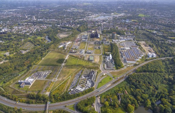 Phönix-West area and Hoesch-Gasometer with the Phoenix Lake in the background as well as Wilo Park, BMW branch Dortmund, INTECH Die Industrieausrüster and Amprion GmbH Stromversorger in the district Hörde in Dortmund, Ruhr area, North Rhine-Westphalia, Germany, Amprion GmbH Stromversorger, DE, monument protection, Dortmund, Europe, commercial enterprises, commercial area, commercial park, commercial location, commercial use, industrial area, industrial building, industrial location, innovation location, aerial view, aerial photograph, aerial photography, aerial photography, Phoenix-See, Phoenix-West, overview, bird's-eye view, birds-eyes view, former blast furnace plant, overview