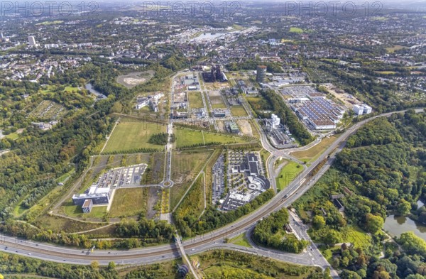 Phönix-West area and Hoesch-Gasometer with the Phoenix Lake in the background as well as Wilo Park, BMW branch Dortmund, INTECH Die Industrieausrüster and Amprion GmbH Stromversorger in the district Hörde in Dortmund, Ruhr area, North Rhine-Westphalia, Germany, Amprion GmbH Stromversorger, DE, monument protection, Dortmund, Europe, commercial enterprises, commercial area, commercial park, commercial location, commercial use, industrial area, industrial building, industrial location, innovation location, aerial view, aerial photograph, aerial photography, aerial photography, Phoenix-See, Phoenix-West, overview, bird's-eye view, birds-eyes view, former blast furnace plant, overview