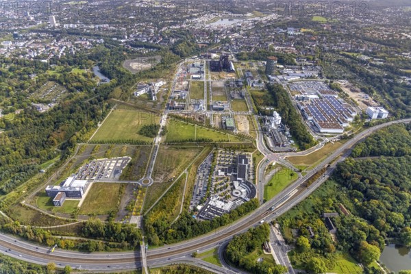 Phönix-West area and Hoesch-Gasometer with the Phoenix Lake in the background as well as Wilo Park, BMW branch Dortmund, INTECH Die Industrieausrüster and Amprion GmbH Stromversorger in the district Hörde in Dortmund, Ruhr area, North Rhine-Westphalia, Germany, Amprion GmbH Stromversorger, DE, monument protection, Dortmund, Europe, commercial enterprises, commercial area, commercial park, commercial location, commercial use, industrial area, industrial building, industrial location, innovation location, aerial view, aerial photograph, aerial photography, aerial photography, Phoenix-See, Phoenix-West, overview, bird's-eye view, birds-eyes view, former blast furnace plant, overview