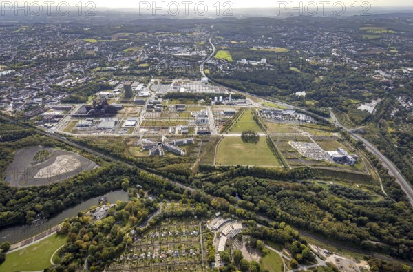 Phönix-West Areal and Hoesch-Gasometer as well as Wilo Park, BMW branch Dortmund, INTECH Die Industrieausrüster and Amprion GmbH Stromversorger in the district Hörde in Dortmund, Ruhr area, North Rhine-Westphalia, Germany, Amprion GmbH Stromversorger, DE, monument protection, Dortmund, Europe, commercial enterprises, commercial area, commercial area, commercial park, commercial location, commercial use, industrial area, industrial building, industrial location, innovation location, aerial view, aerial photograph, aerial photography, aerial photography, Phoenix-See, Phoenix-West, overview, bird's-eye view, birds-eyes view, former blast furnace plant, overview