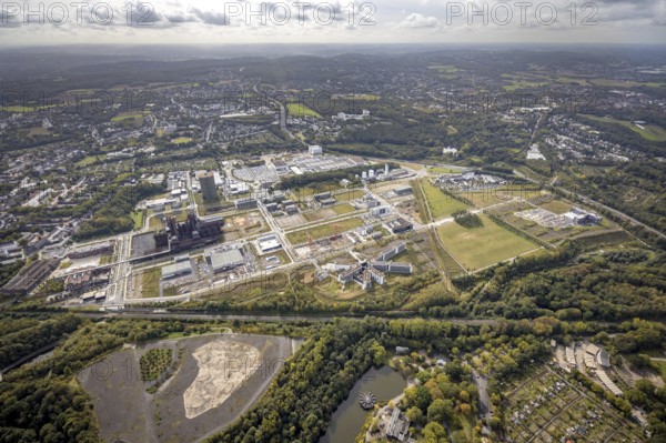 Phönix-West Areal and Hoesch-Gasometer as well as Wilo Park, BMW branch Dortmund, INTECH Die Industrieausrüster and Amprion GmbH Stromversorger in the district Hörde in Dortmund, Ruhr area, North Rhine-Westphalia, Germany, Amprion GmbH Stromversorger, DE, monument protection, Dortmund, Europe, commercial enterprises, commercial area, commercial area, commercial park, commercial location, commercial use, industrial area, industrial building, industrial location, innovation location, aerial view, aerial photograph, aerial photography, aerial photography, Phoenix-See, Phoenix-West, overview, bird's-eye view, birds-eyes view, former blast furnace plant, overview