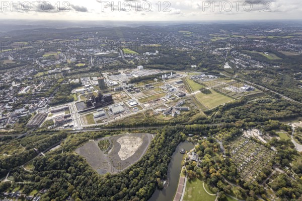 Phönix-West Areal and Hoesch-Gasometer as well as Wilo Park, BMW branch Dortmund, INTECH Die Industrieausrüster and Amprion GmbH Stromversorger in the district Hörde in Dortmund, Ruhr area, North Rhine-Westphalia, Germany, Amprion GmbH Stromversorger, DE, monument protection, Dortmund, Europe, commercial enterprises, commercial area, commercial area, commercial park, commercial location, commercial use, industrial area, industrial building, industrial location, innovation location, aerial view, aerial photograph, aerial photography, aerial photography, Phoenix-See, Phoenix-West, overview, bird's-eye view, birds-eyes view, former blast furnace plant, overview