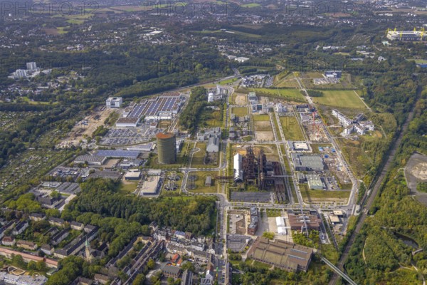 Phönix-West Areal and Hoesch-Gasometer as well as Wilo Park, BMW branch Dortmund, INTECH Die Industrieausrüster and Amprion GmbH Stromversorger in the district Hörde in Dortmund, Ruhr area, North Rhine-Westphalia, Germany, Amprion GmbH Stromversorger, DE, monument protection, Dortmund, Europe, commercial enterprises, commercial area, commercial area, commercial park, commercial location, commercial use, industrial area, industrial building, industrial location, innovation location, aerial view, aerial photograph, aerial photography, aerial photography, Phoenix-See, Phoenix-West, overview, bird's-eye view, birds-eyes view, former blast furnace plant, overview