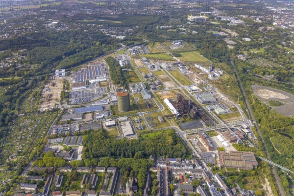 Phönix-West Areal and Hoesch-Gasometer as well as Wilo Park, BMW branch Dortmund, INTECH Die Industrieausrüster and Amprion GmbH Stromversorger in the district Hörde in Dortmund, Ruhr area, North Rhine-Westphalia, Germany, Amprion GmbH Stromversorger, DE, monument protection, Dortmund, Europe, distant view, commercial enterprises, commercial area, commercial area, commercial park, commercial location, commercial use, industrial area, industrial building, industrial location, innovation location, aerial view, aerial photograph, aerial photography, aerial photography, Phönix-West, overview, bird's-eye view, birds-eyes view, former blast furnace plant, overview