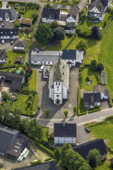 Aerial view, catholic church St. Antonius Einsiedler, Iseringhausen, Drolshagen, Sauerland, North Rhine-Westphalia, Germany, place of worship, DE, monument protection, Europe, religious community, place of worship, holy place, church, parish, denomination, aerial view, aerial photography, aerial photography, religion, religious site, overview, bird's-eye view, birds-eyes view, overview