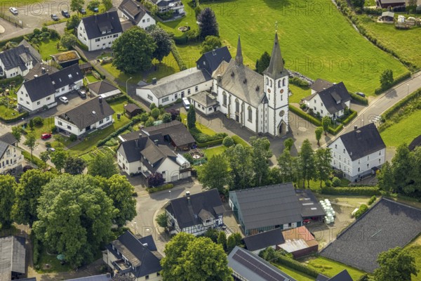 Aerial view, catholic church St. Antonius Einsiedler, Iseringhausen, Drolshagen, Sauerland, North Rhine-Westphalia, Germany, place of worship, DE, monument protection, Europe, religious community, place of worship, holy place, church, parish, denomination, aerial view, aerial photography, aerial photography, religion, religious site, overview, bird's-eye view, birds-eyes view, overview