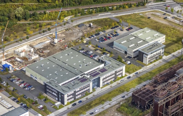 Phoenix-West area with company building Albonair and Centre for Production Technology at Carlo-Schmid-Allee in the district Hörde in Dortmund, Ruhr area, North Rhine-Westphalia, Germany, AAP-NDT GmbH, CTM-do GmbH, DE, Dortmund, Europe, commercial enterprises, commercial area, industrial area, commercial park, commercial location, commercial use, industrial area, industrial building, industrial location, innovation location, aerial view, aerial photograph, aerial photography, aerial photography, ORONTEC GmbH, Phönix-West, overview, bird's-eye view, birds-eyes view, former blast furnace plant, overview