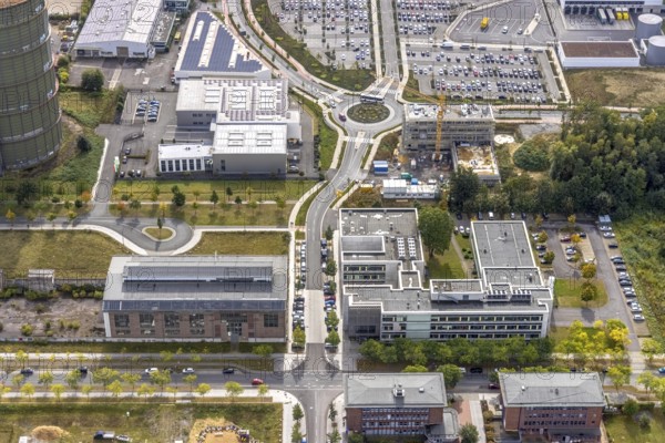 Phoenix-West area with company buildings MST Factory and ION-GAS GmbH on Konrad-Adenauer-Allee in the Hörde district of Dortmund, Ruhr area, North Rhine-Westphalia, Germany, Bartels Mikrotechnik GmbH, DE, Dortmund, Europe, commercial enterprises, commercial area, industrial estate, business park, commercial location, commercial use, industrial area, industrial building, industrial location, innovation location, aerial view, aerial photograph, aerial photography, aerial photography, Micronit GmbH, Phönix-West, overview, bird's-eye view, old factory building, birds-eyes view, former blast furnace plant, overview