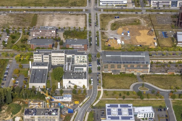 Phönix-West area with company buildings MST Factory and ION-GAS GmbH at Konrad-Adenauer-Allee in the district Hörde in Dortmund, Ruhr area, North Rhine-Westphalia, Germany, Bartels Mikrotechnik GmbH, DE, Dortmund, Europe, commercial enterprises, commercial area, industrial estate, industrial park, commercial location, commercial use, industrial area, industrial building, industrial location, innovation location, aerial view, aerial photograph, aerial photography, aerial photography, Micronit GmbH, Phönix-West, overview, bird's-eye view, old factory building, birds-eyes view, former blast furnace plant, overview, temicon GmbH