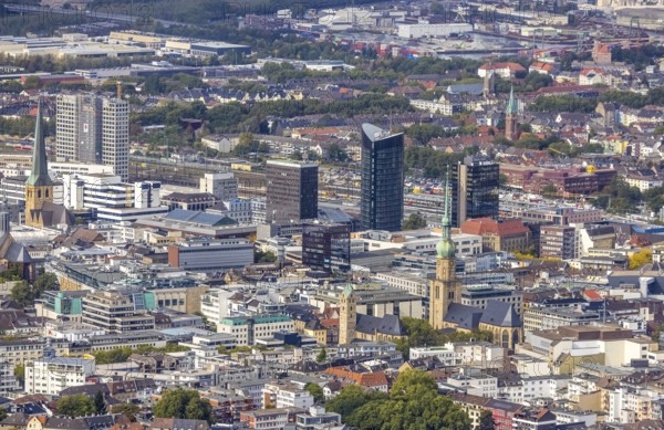 View of the city centre with St. Marien Protestant Church, St. Reinoldi Church, IWO Tower, RWE Tower, Sparkasse Tower, Harenberg City-Center Tower and St. Petri Church. Petri in the district City in Dortmund, Ruhr area, North Rhine-Westphalia, Germany, place of worship, City, DE, Dortmund, Europe, religious community, place of worship, holy place, city centre, church, parish, denomination, aerial view, aerial photograph, aerial photography, aerial view, panoramic photo, Petrikirche, religion, religious site, skyline, townscape, city centre, overview, bird's-eye view, overview