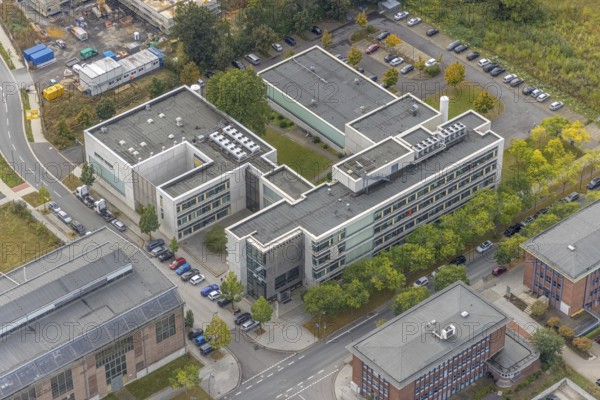 Phoenix-West area with company buildings MST Factory and ION-GAS GmbH on Konrad-Adenauer-Allee in the Hörde district of Dortmund, Ruhr area, North Rhine-Westphalia, Germany, Bartels Mikrotechnik GmbH, DE, Dortmund, Europe, commercial enterprises, commercial area, industrial estate, business park, commercial location, commercial use, industrial area, industrial building, industrial location, innovation location, aerial view, aerial photograph, aerial photography, aerial photography, Micronit GmbH, Phönix-West, overview, bird's-eye view, birds-eyes view, former blast furnace plant, overview