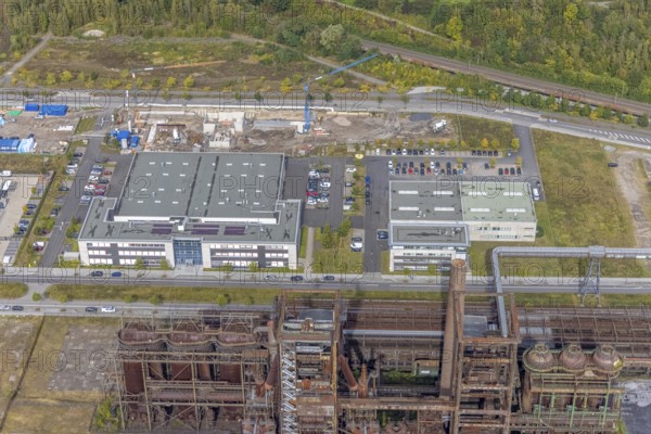 Phoenix-West area with company building Albonair and Centre for Production Technology at Carlo-Schmid-Allee in the district Hörde in Dortmund, Ruhr area, North Rhine-Westphalia, Germany, AAP-NDT GmbH, CTM-do GmbH, DE, Dortmund, Europe, commercial enterprises, commercial area, industrial area, commercial park, commercial location, commercial use, industrial area, industrial building, industrial location, innovation location, aerial view, aerial photograph, aerial photography, aerial photography, ORONTEC GmbH, Phönix-West, overview, bird's-eye view, birds-eyes view, former blast furnace plant, overview