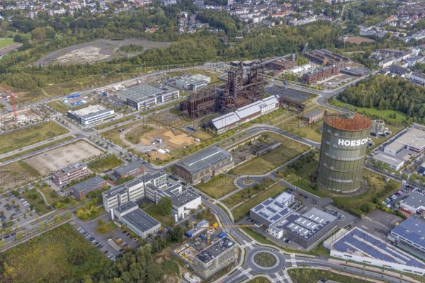 Phönix-West Areal and Hoesch-Gasometer and KIS Antriebstechnik GmbH with solar roof as well as company building Konrad-Adenauer-Allee with old factory building in the district Hörde in Dortmund, Ruhr area, North Rhine-Westphalia, Germany, Albonair, Bartels Mikrotechnik GmbH, DE, Dortmund, Europe, commercial enterprises, commercial area, commercial park, commercial location, commercial use, ION-GAS GmbH, industrial area, industrial building, industrial location, innovation location, aerial view, aerial photograph, aerial photography, aerial photography, MST Factory, Micronit GmbH, Phönix-West, overview, bird's eye view, centre for production technology, birds-eyes view, former blast furnace plant, overview