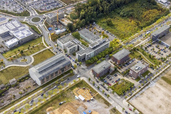 Phönix-West area with company building MST Factory and ION-GAS GmbH at Konrad-Adenauer-Allee in the district Hörde in Dortmund, Ruhr area, North Rhine-Westphalia, Germany, Bartels Mikrotechnik GmbH, DE, Dortmund, Europe, commercial enterprises, commercial area, commercial park, commercial location, commercial use, ION-GAS GmbH, industrial area, industrial building, industrial location, innovation location, aerial view, aerial photograph, aerial photography, aerial photography, MST Factory, Micronit GmbH, Phönix-West, overview, bird's-eye view, old factory building, birds-eyes view, former blast furnace plant, overview