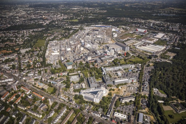 Aerial view, Henkel AG chemical plant with the triangular building Henkel Z55 Adhesive Innovation Center in Holthausen, Düsseldorf, Rhineland, North Rhine-Westphalia, Germany, DE, triangular shape, Europe, commercial enterprises, commercial area, commercial area, commercial location, commercial use, industrial area, industrial building, industrial location, innovation centre Henkel, aerial view, aerial photography, aerial photography, overview, bird's-eye view, overview