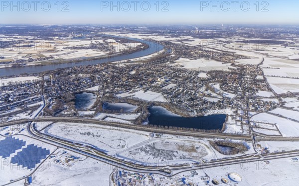 Aerial view, winter landscape at Düsseldorf Airport with river Rhine and Lambertus Lake, Fliedner Lake and Suitbertus Lake, Kalkum, Düsseldorf, Rhineland, North Rhine-Westphalia, Germany, DE, Europe, aerial view, aerial photography, aerial photography, snow, lake, solar plant, overview, bird's eye view, winter, birds-eyes view, overview