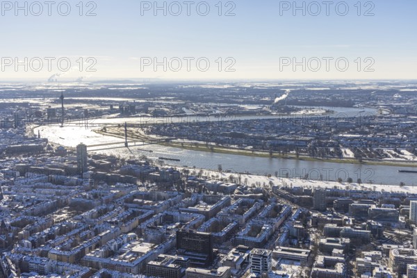 Aerial view, river Rhine with Oberkasseler Brücke, Rheinkniebrücke and Rheinturm, Altstadt, Düsseldorf, Rhineland, North Rhine-Westphalia, Germany, bridge, DE, Europe, river Rhine, aerial view, aerial photography, aerial photography, snow, tower, overview, bird's eye view, winter, birds-eyes view, overview
