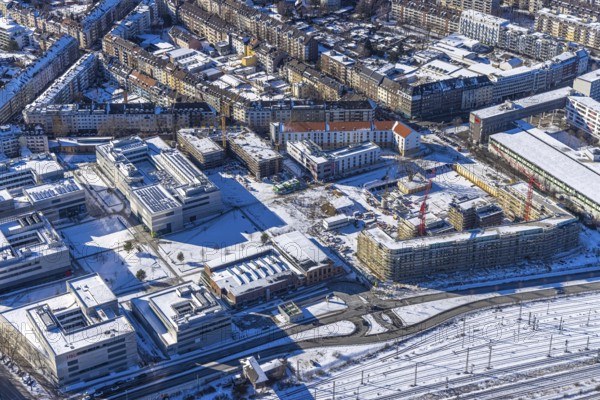 Aerial view, construction site of the new Centre for Digitisation and Digitality (ZDD) on the campus of Düsseldorf University of Applied Sciences, Derendorf, Düsseldorf, Rhineland, North Rhine-Westphalia, Germany, construction work, construction area, building site, building plots, construction project, construction site, DE, Elfriede Bial Straße, Europe, aerial photograph, aerial photography, aerial photography, new building, Rose Ausländer Straße, snow, overview, bird's-eye view, winter, birds-eyes view, overview