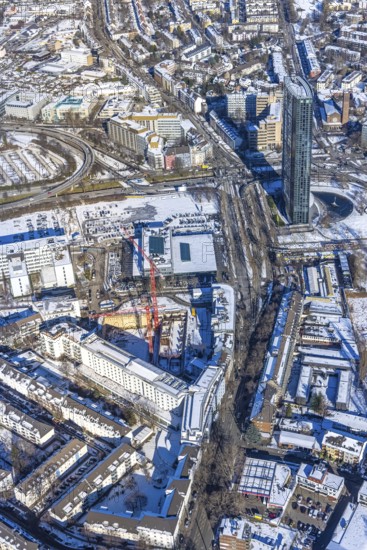 Aerial view, construction site new building office and residential complex, UpperNord Tower Düsseldorf, Mercedesstraße, Düsseltal, Düsseldorf, Rhineland, North Rhine-Westphalia, Germany, construction work, construction, construction area, building site, building plots, construction project, construction site, DE, Europe, aerial view, aerial photography, aerial photography, new building, snow, overview, bird's-eye view, winter, birds-eyes view, overview