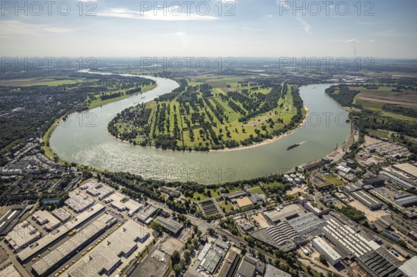 Aerial view, river Rhine Rhine bend with meadows and fields Zonser Grind and camping site Rheinblick am Zonser Grind in Stürzelberg, Dormagen, Rhineland, North Rhine-Westphalia, Germany, inland navigation, camping, camping site, campsite, DE, Europe, green trees, aerial view, aerial photography, aerial photography, Rhine bend, shipping traffic, overview, bird's-eye view, meadows and fields, birds-eyes view, overview