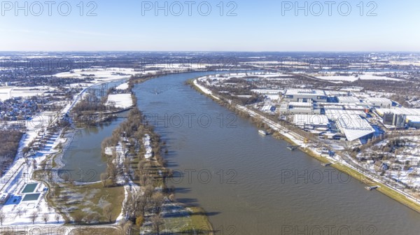 Aerial view, Messe Düsseldorf, MERKUR SPIEL-ARENA football stadium, river Rhine, Düsseldorf, Rhineland, North Rhine-Westphalia, Germany, arena, DE, Europe, Fortuna Düsseldorf F95, football pitch, football stadium, aerial view, aerial photography, aerial photography, exhibition centre on the Rhine, snow, sports facilities, sports field, sports facility, stadium, overview, events, venue, event location, bird's eye view, winter, birds-eyes view, overview