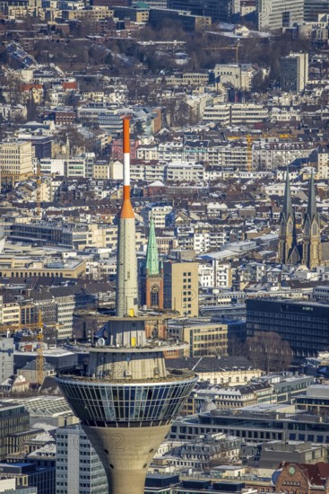 Aerial view, Rhine Tower in the Media Harbour, St. John's Church in the background, harbour, Düsseldorf, Rhineland, North Rhine-Westphalia, Germany, place of worship, office use, DE, Europe, trade, commercial enterprises, commercial area, commercial park, commercial location, commercial use, religious community, place of worship, holy place, industry, industrial area, industrial site, church, parish, denomination, logistics, aerial view, aerial photography, aerial photography, religion, religious site, snow, tower, overview, bird's-eye view, winter, birds-eyes view, overview