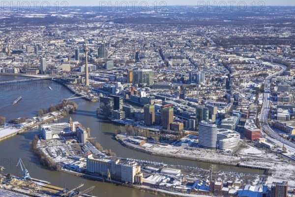 Aerial view, media harbour with Rhine Tower, harbour, Düsseldorf, Rhineland, North Rhine-Westphalia, Germany, office use, DE, Europe, commercial, commercial enterprises, commercial area, commercial park, commercial location, commercial use, industry, industrial area, industrial location, logistics, aerial view, aerial photography, aerial photography, aerial photography, snow, tower, overview, bird's eye view, winter, birds-eyes view, overview