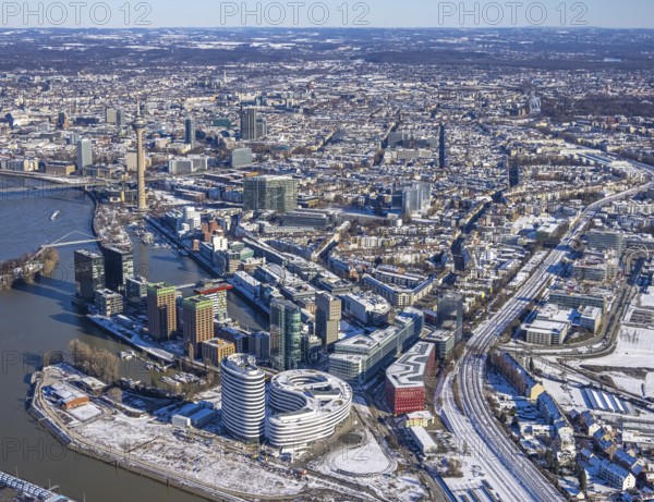 Aerial view, media harbour with Rhine Tower, harbour, Düsseldorf, Rhineland, North Rhine-Westphalia, Germany, office use, DE, Europe, commercial, commercial enterprises, commercial area, commercial park, commercial location, commercial use, industry, industrial area, industrial location, logistics, aerial view, aerial photography, aerial photography, aerial photography, snow, tower, overview, bird's eye view, winter, birds-eyes view, overview