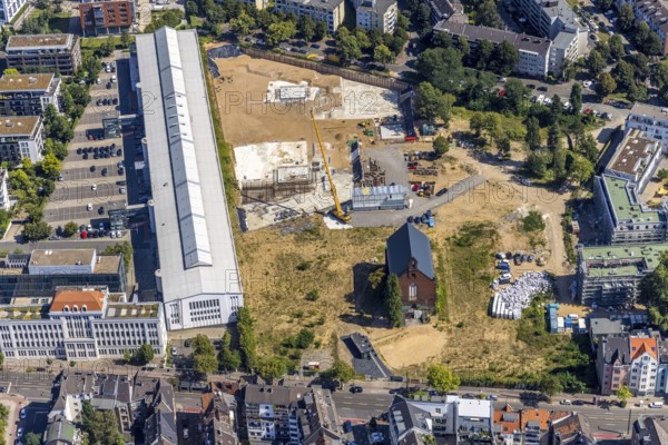 Aerial view, construction site Ulmer Höh and new construction city quarter maxfrei in the district Derendorf in Düsseldorf, Rhineland, North Rhine-Westphalia, Germany, construction work, construction area, building site, building plots, construction project, construction site, DE, Düsseldorf, Europe, property tax, real estate, aerial view, aerial photography, aerial photography, new construction, Ulmer Höh project, overview, bird's-eye view, residential complex, residential area, residential buildings, residential quality, residential neighbourhood, housing estate, birds-eyes view, former prison, overview