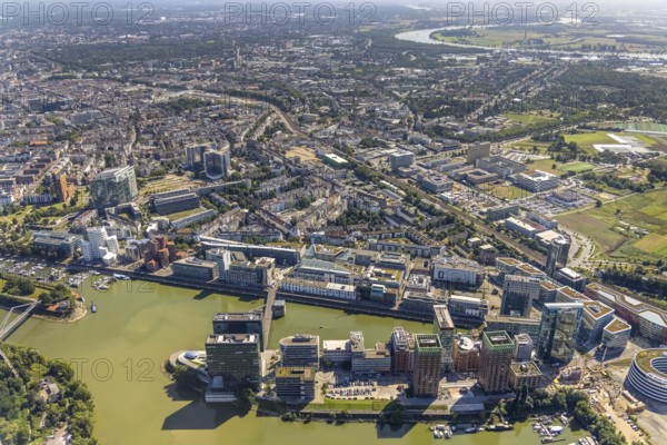 Aerial view, Medienhafen in the former Rhine harbour in Düsseldorf, Rhineland, North Rhine-Westphalia, Germany, DE, Düsseldorf, Europe, commercial enterprises, commercial area, commercial park, commercial location, commercial use, harbour, harbour area, harbour area, industrial area, industrial building, industrial location, aerial photograph, aerial photography, aerial photography, overview, bird's eye view, birds-eyes view, former Rhine harbour, overview