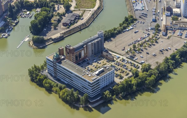 Aerial view, Plange Mühle conversion for a clinic in the media harbour in the harbour in Düsseldorf, Rhineland, North Rhine-Westphalia, Germany, DE, Düsseldorf, Europe, commercial enterprises, commercial area, commercial park, commercial location, commercial use, harbour, harbour area, harbour area, industrial area, industrial building, industrial location, aerial photograph, aerial photography, aerial photography, overview, bird's eye view, Weizenmühlenstraße, birds-eyes view, former Rhine harbour, overview