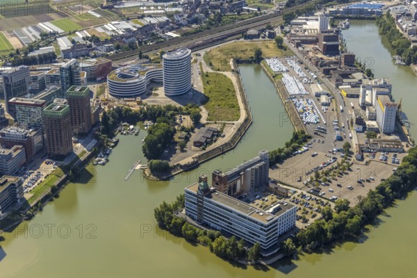 Aerial view, Plange Mühle conversion for a clinic in the media harbour in the harbour in Düsseldorf, Rhineland, North Rhine-Westphalia, Germany, DE, Düsseldorf, Europe, commercial enterprises, commercial area, commercial park, commercial location, commercial use, harbour, harbour area, harbour area, industrial area, industrial building, industrial location, aerial photograph, aerial photography, aerial photography, overview, bird's eye view, Weizenmühlenstraße, birds-eyes view, former Rhine harbour, overview