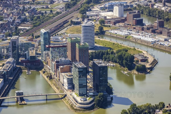 Aerial view, Media harbour skyline in the former Rhine harbour in Düsseldorf, Rhineland, North Rhine-Westphalia, Germany, DE, Düsseldorf, Europe, commercial enterprises, commercial area, commercial park, commercial location, commercial use, harbour, harbour area, harbour area, industrial area, industrial building, industrial location, aerial view, aerial photography, aerial photography, overview, bird's eye view, birds-eyes view, former Rhine harbour, overview